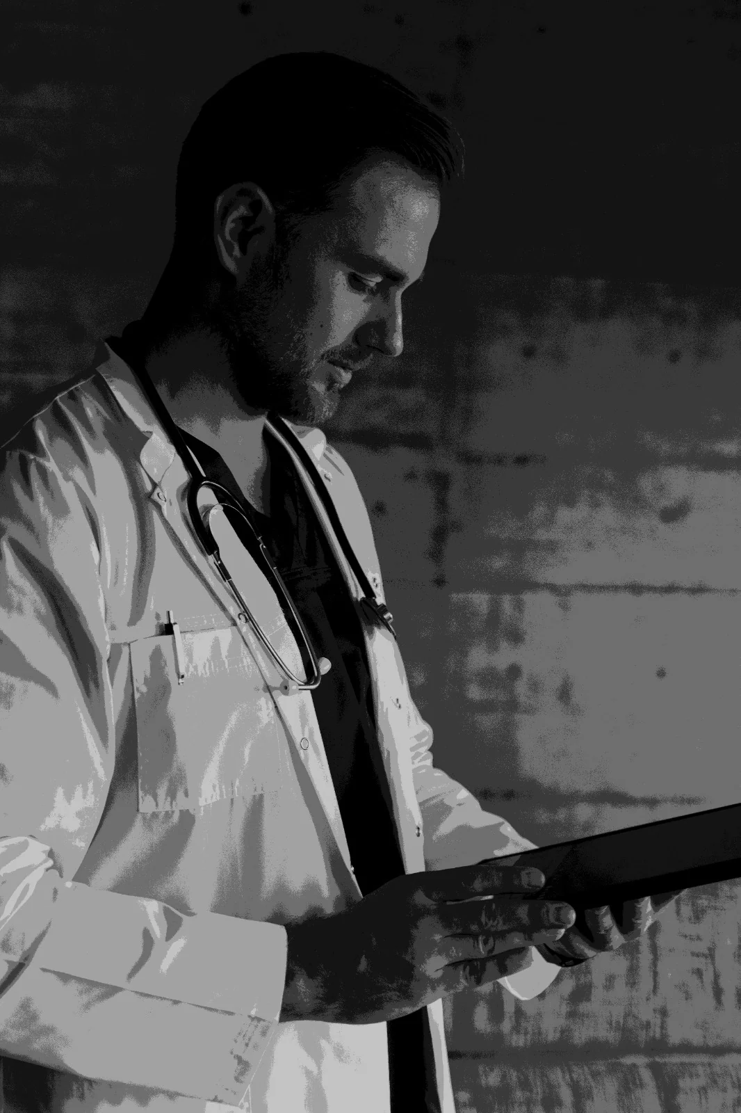 Doctor reviewing healthcare information on a tablet