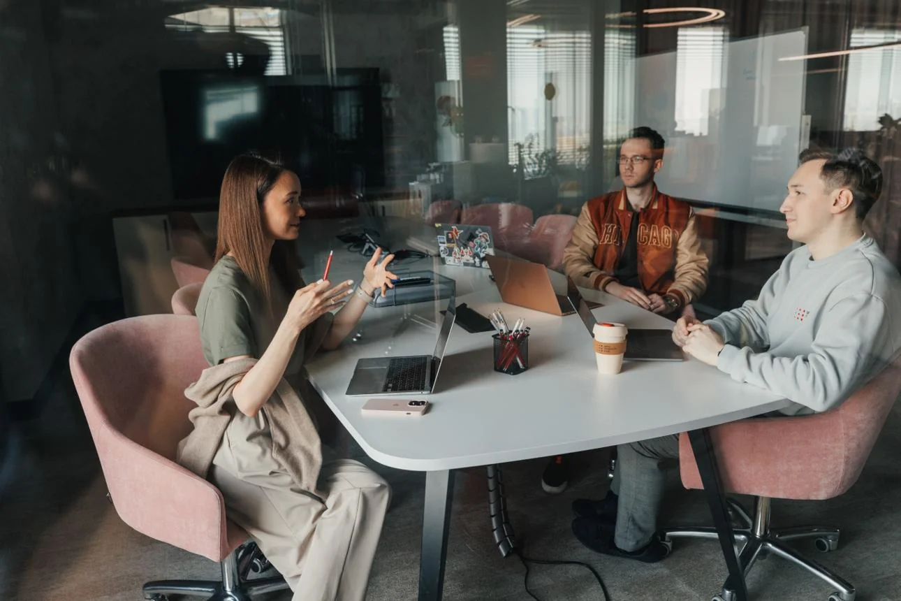 Start-up team meeting in a modern workspace to discuss innovation strategy